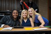 Physician Assistant Studies graduates (from left) Jai’Cee Tudman, Peyton Travis, and Megan Thomas take a moment for a group photo.