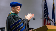 Andrew Zinn, M.D., Ph.D., Dean of the Graduate School, applauds the graduates and provides welcome remarks.