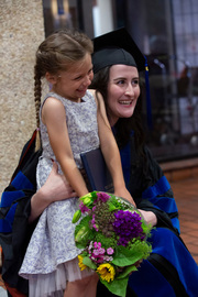 Dr. Elizabeth Aguilera celebrates with a family member.