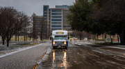 In January, a winter storm brought snowy conditions to North Texas. The campus transit system was prepared, with staff braving through snow, rain, and any weather the state served up. Above, the North/South Connector shuttle bus made a stop on North Campus during the icy event.