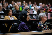 Attendees listen to the keynote address.