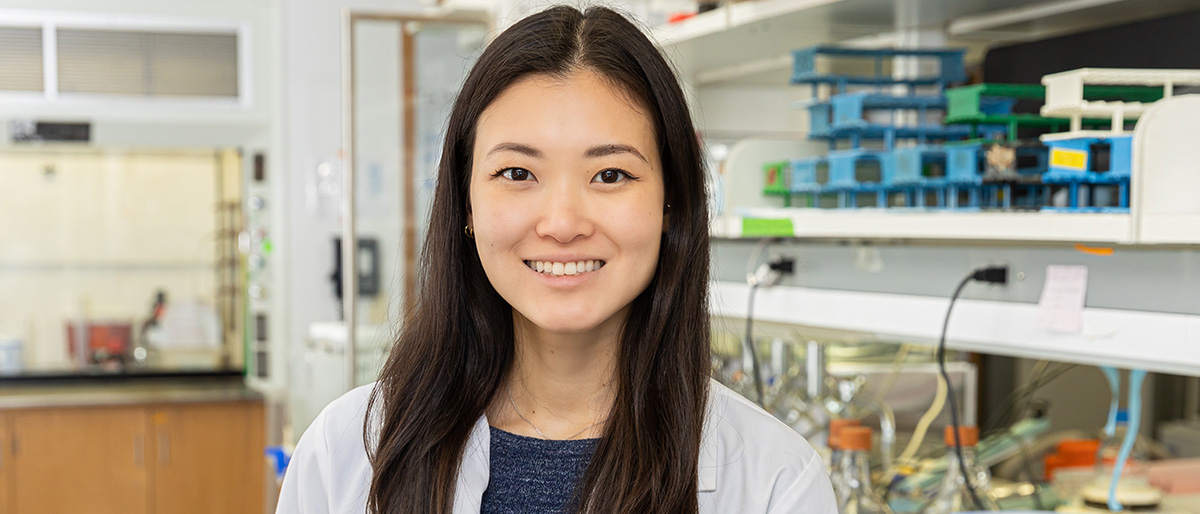 girl with long brown hair in lab