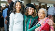 Ava Wilson, M.D., (center) poses with for a photo with her family who are excited for the future.