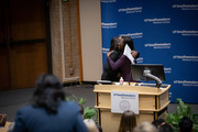 Dr. Nesbitt hugs Dr. Bowen Matthew at the conclusion of the keynote address.