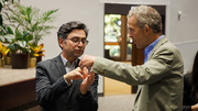 Symposium speakers Ardem Patapoutian, Ph.D., (left) and K. Christopher Garcia, Ph.D., discuss their research during a break in the symposium.