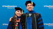 Doctor of Philosophy in Applied Clinical Research graduates Victoria Gonzalez and Jan Petric take time for a post-commencement photo.