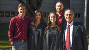 Master of Prosthetics-Orthotics graduates Ashton Blasingim (first row, second from left) and Ariel Fortenberry (first row, second from right) and their families