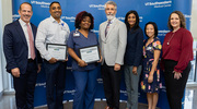 PACT Platinum pin honorees Renjith Samuel, and LaShaunda Greer-Donnelle pictured with Health System leaders.