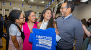 Brianna Wilson (center) and her family are all smiles after finding out she matched to University of Chicago.