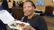 Iran Smith, an ERP Specialist and BRG member, enjoys food at the celebration