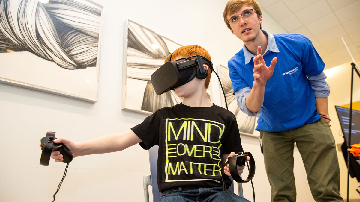 A visitor tests virtual reality goggles.