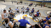 Student athletes from the UTA Movin’ Mavs wheelchair basketball team gather for a huddle during the seventh annual UTSW/DFW Adaptive Sports Expo at the UT Arlington Maverick Activities Center. The Oct. 14 event showcased a variety of sports, recreational, fitness, and wellness activities available to individuals with impairments and disabilities. The annual event aims to increase awareness, access, and engagement in adaptive and Para sports.