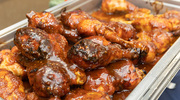 Among the tasty foods is barbecue chicken, ready to be served.