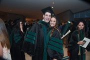 UTSW Medical School students in lobby following commencement