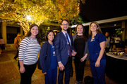 Supporters gather around Dr. David Fetzer (center), from left: Monica Morgan, Kim Pong, Laura Reynolds, and Skye Smola