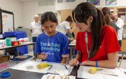 Learning about how to suture by practicing on a banana peel.