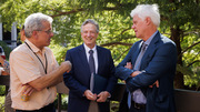 Enjoying the reception are (from left) John Abrams, Ph.D., Andrew Zinn, M.D., Ph.D., and Dr. Olson.