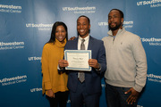 Scholarship finalist Cameron Ward celebrates with his sister Courtlyn Ward and brother Cody Ward.