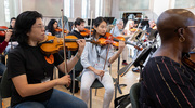 Dr. Feng and Ms. Wang were among four UTSW orchestra members who played the violin.