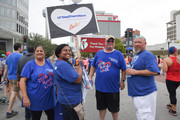 Walkers from UTSW's Endoscopy team show off the front of their shirts.