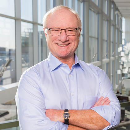 Man in glasses, blue button shirt