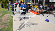 Three ironing boards, provided by Calios Tacos, are repurposed as portable outdoor tables.