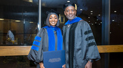 Biomedical Engineering graduate Esther “Dami” Alao, Ph.D., celebrates the moment with Dr. Corbin.