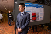 Medical student William Ou waits to present his research project to judges