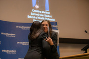 Christina Martinez receives a hug from Dr. Nesbitt.
