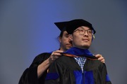 Dr. Xingjian Zhang earned his doctorate in neuroscience.