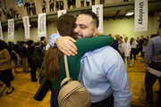 Alvand Sehat, who matched in General Surgery at Rutgers-New Jersey Medical School, hugs friend Ruba Alafifi.
