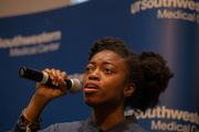 Medical student Deborah Oyedapo sings "If You're Out There" by John Legend during a musical performance.