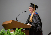 Dr. Ondine Cleaver, Chair of the Genetics, Development and Disease Graduate Program, calls graduating students up to the stage.