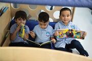 Learning to read is always a joy, especially for these three buddies.