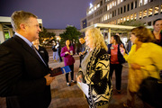 Dr. Robert Timmerman, 2019 Watson Award recipient, mingles on the plaza with Nurse Practitioner Terri Kelley-Griffis.