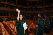 Medical students file into the Morton H. Meyerson Symphony Center auditorium for commencement.