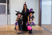 Three good witches pose for a group shot.