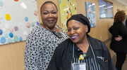 Nutrition Services team members Veronica “Ronnie” Ross (left) and Kollette Whylly pose for a photo.