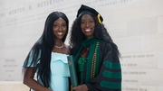 Fatou Sahor, M.D., M.P.H., (right) and her sister capture the memory to last a lifetime.
