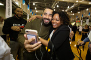 Evan Wright (center), who will serve his Anesthesiology residence at Baylor College of Medicine in Houston, hugs his classmate, Adrienne Walker. Evan's older brother Elliot Wright (left) joined in the celebration.