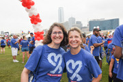 Julia Kanellos and Suzanne Farmer with the Dallas skyline behind them