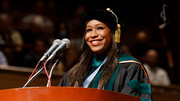 Ho Din Award winner Dr. Cayenne Price speaks to fellow graduates at commencement. The Ho Din, from Southwestern Medical Foundation, is the top honor for a UTSW medical student.