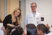 Dr. Campbell and Dr. Scott welcome students to the Sim Center.