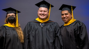 Master of Prosthetics-Orthotics graduate Tyler Cagle (center) enjoys the moment with faculty members Tiffany Graham, M.S.P.O., and Fabian Soldevilla, M.S.P.O.