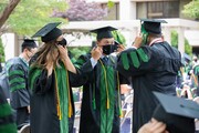 Graduates were given UT Southwestern masks to wear during the ceremony as masking and social distancing policies remain in place as a precaution amid the pandemic.