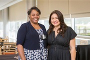 Arbidella “Della” Hoof (left), of Simmons Cancer Center Administration, and SCCC Infusion Patient Advocate Volunteer Amanda Reuter. As an advocate, Ms. Reuter assists patients through the infusion process.