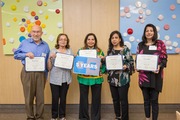 The “5 Years” honorees: Mr. Riegel, Ms. Merchant, Ms. Ali, Ms. Karim, and Ms. Mehdi.