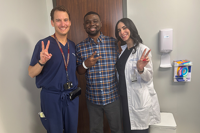 Dr. Nauser, patient Justin Tuck, and Dr. Chediak celebrate successful transplant - primary