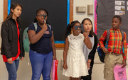 Children lined up to have their peepers checked.