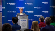 Honoree Joan Conaway, Ph.D., Vice Provost and Dean of Basic Research, congratulates other honorees on their accomplishments.